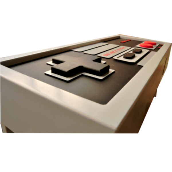 Mesa de centro gamer con forma de control de Nintendo